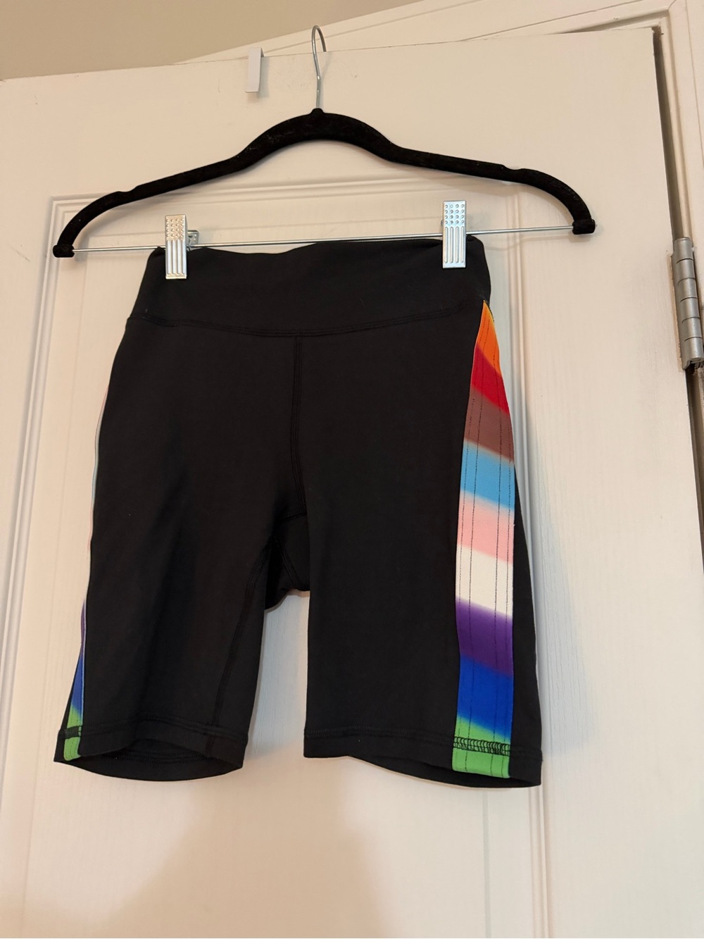 Gilly Hicks black biker shorts with rainbow stripe down the side, size XS